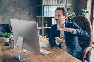 Profile side view portrait of his he nice handsome cheerful man ceo boss chief shark expert specialist attending web meeting discussing strategy at modern loft concrete industrial work place station