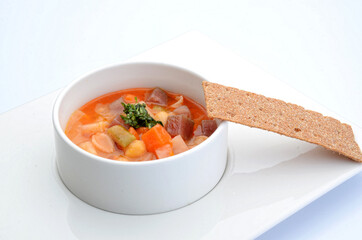 stewed vegetables fancy presentation white background