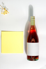 Greeting card with mockup rose wine, flower and letter.