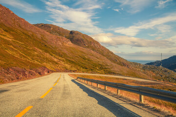 Driving a car on a mountain road. Nature of Norway. Polar circle. The way to Nordkapp (Noth Cape)