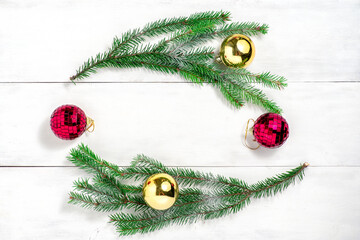 christmas background. Christmas balls and spruce branches on a white background. space for text