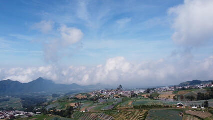 Fototapeta na wymiar wide and beautiful sky views of the countryside on the slopes of Mount Sumbing