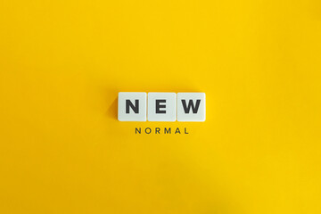 New Normal Buzzword and Banner. Block letters on bright yellow orange background. Minimal aesthetics.