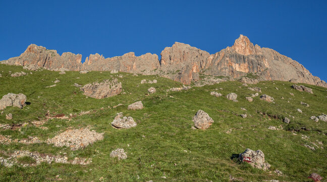 Cresta del Masare (Masare ridge) with Masare mountain at the foot of Roda di Vael refuge as seen from trail 549 to the refuge, Catinaccio/Rosengarten mountain massif, Dolomites, South Tirol, Italy.