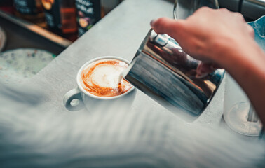 Barista hand making cappuccino Coffee in cafe