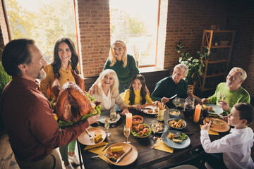 Portrait of nice attractive adorable cheerful cheery glad family relatives parents meeting carrying plate fresh homemade turkey reunion custom season at modern loft industrial brick interior house