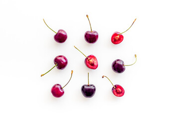 Fototapeta na wymiar Ripe juicy cherries berries background. Overhead view, flat lay