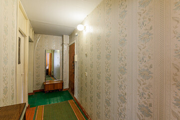 Russia, Moscow- February 15, 2020: interior room shabby old sloppy not modern furnishings. cosmetic repairs required