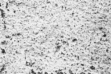 Texture of a concrete wall with cracks and scratches which can be used as a background