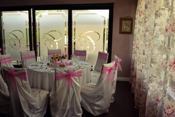 living room with festive meals. restaurant arranged for the event