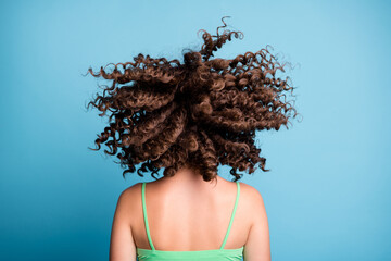Closeup portrait rear back photo of young lady throwing big extensive volume hairdo pretty curls...