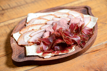 Georgian meat with garlic. Georgian food, Georgian dishes. Traditional cuisine concept. Different kinds of meat.