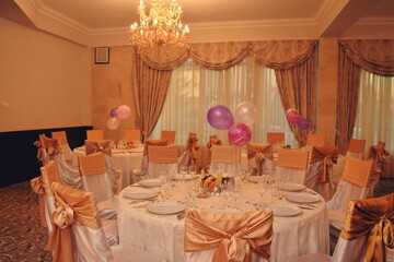 living room with festive meals. restaurant arranged for the event