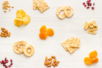 Pattern of snacks mix top view - nuts and dried fruits