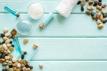 Spa set bar of sea cosmetics - aroma oil and blue salt. Above view
