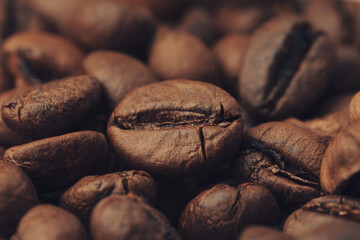 Coffee beans macro as a background.  Aromatic coffee beans dark roast