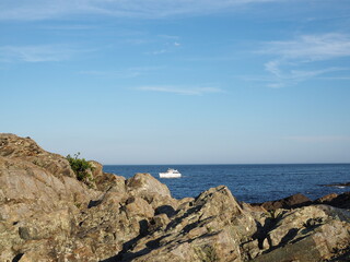 Fototapeta na wymiar coastal Maine rocks and boat