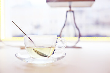 English tea in a cafe / cup and kettle with five o'clock tea