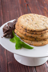 Oat cookies served on wooden table close up
