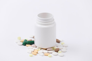 Pills bottle on white background close up