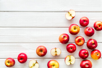 Naklejka na ściany i meble Apples background on kitchen desk - top view
