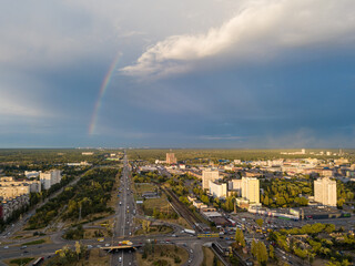 Obraz premium Aerial drone view. Rainbow over a residential area of Kiev.