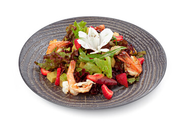 Salad with grilled shrimps isolated on white