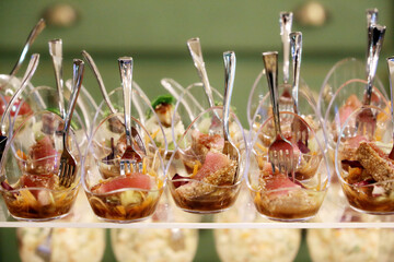 Gourmet snacks with meat and vegetables on the festive table. concept of celebration, banquet, romantic dinner party