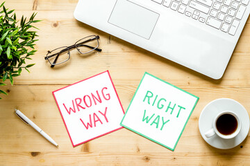 Problem solving. Right and wrong way icons on work desk from above