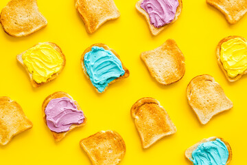 Set of slices toast bread with butter and cheese spread. Top view