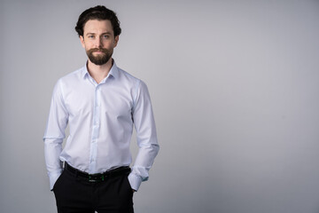 Cheerful young man, isolated on white background look at camera