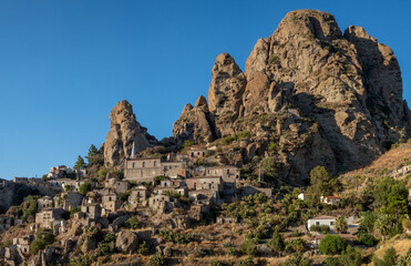 The abandoned village of Pentedattilo at sunset. Aspromonte, Calabria, Italy.
