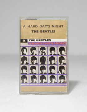 london, uk, 20/05/202 The beatles a hard day's night cassette tape from 1964 paper label parlophone emi uk. Vintage famous beatles music audio tape on a white background.