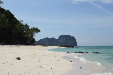 empty turquoise and white paradise beach in thailand