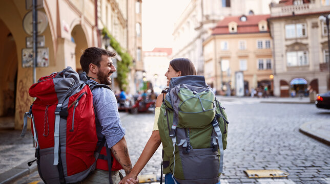 Happy vacation at Europe.People with backpack in love traveling together.