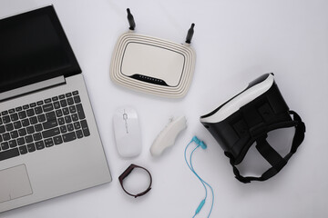Modern youth gadgets on a white background. Top view. Flat lay
