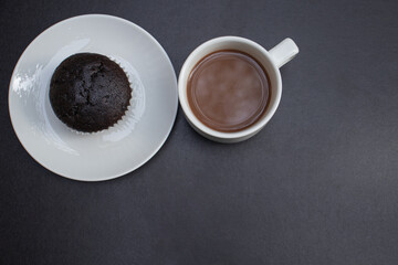 cup of coffee with chocolate cupcakes