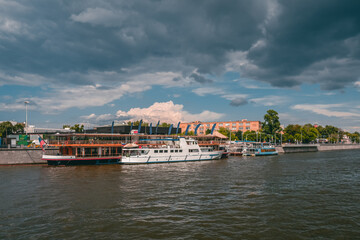 Marina with ships on the Moscow river. White ships on the Moscow river. Beautiful tourist destination in Moscow