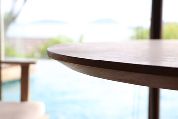 Closeup of wood table, Beautiful  Teak wood texture surface , Closeup top of round dining table