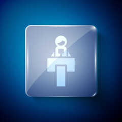 White Stage stand or debate podium rostrum icon isolated on blue background. Conference speech tribune. Square glass panels. Vector.