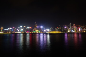 Fototapeta na wymiar City landscape. Victoria Harbor and Hong Kong skyscrapers at night.