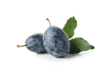 Fresh plums and leaves isolated on white background