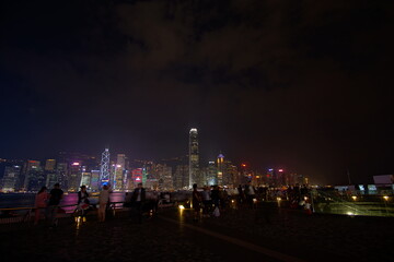 City landscape. Victoria Harbor and Hong Kong skyscrapers at night