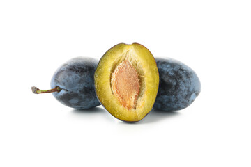 Fresh blue plums isolated on white background