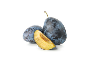 Fresh blue plums isolated on white background