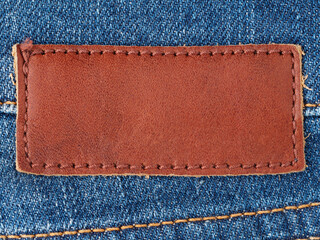 MOSCOW, RUSSIA - DECEMBER 15, 2014 - Closeup of leather label of a pair of Mustang brand denim...