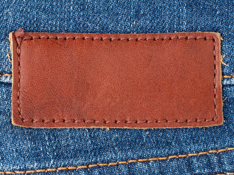 MOSCOW, RUSSIA - DECEMBER 15, 2014 - Closeup of leather label of a pair of Mustang brand denim jeans. Mustang is a is one of the leading jeans brands in Europe.