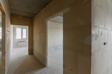 Russia, Moscow- February 15, 2020: interior room rough repair for self-finishing. interior decoration, bare walls of the premises, stage of construction