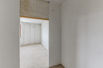 Russia, Moscow- February 15, 2020: interior room rough repair for self-finishing. interior decoration, bare walls of the premises, stage of construction