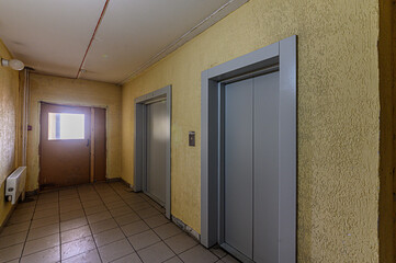 Russia, Moscow- February 15, 2020: interior public place, house entrance. doors, walls, staircase corridors